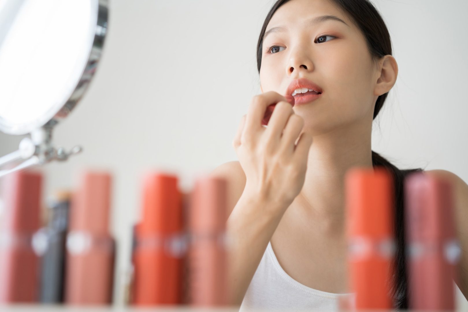 Asian female makeup beauty by lipstick.